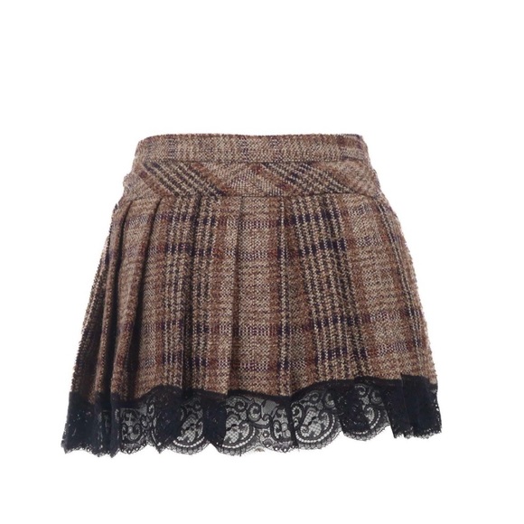 DOLCE & GABBANA
Plaid Print Mini Skirt
Size: S | US4, IT40 - Picture 4 of 7